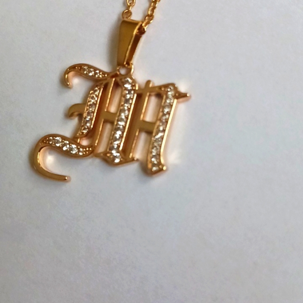 Gold Caligraphy Cubic zirconia Necklace